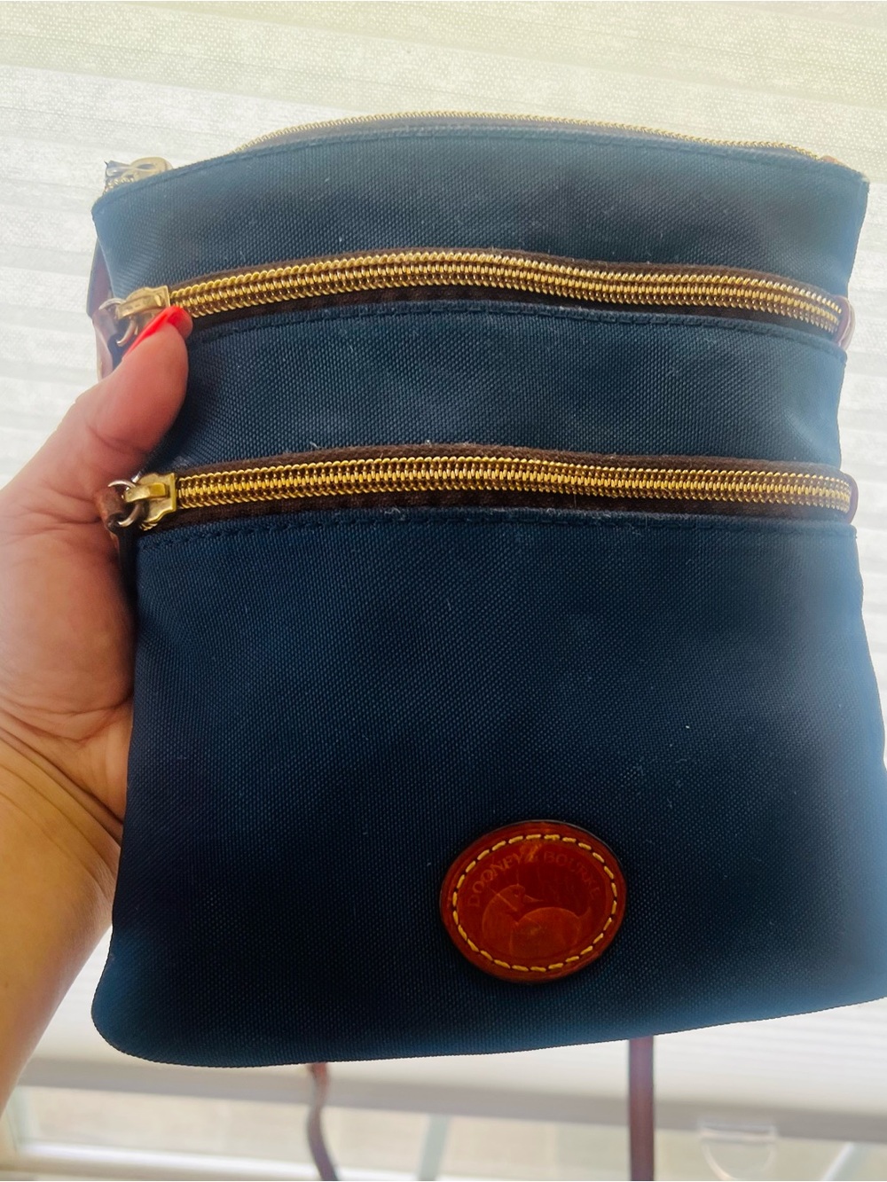 Dooney & Bourke Navy Crossbody with Gold Zippers and Leather Logo